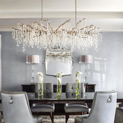 “Luxury crystal chandelier with sculpted metal branches”