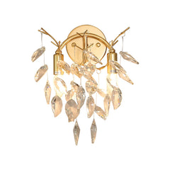 Gold wall sconce with crystal accents on a white background