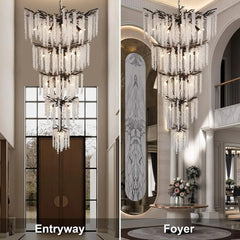 Modern crystal chandelier creating a vertical statement over a loft space