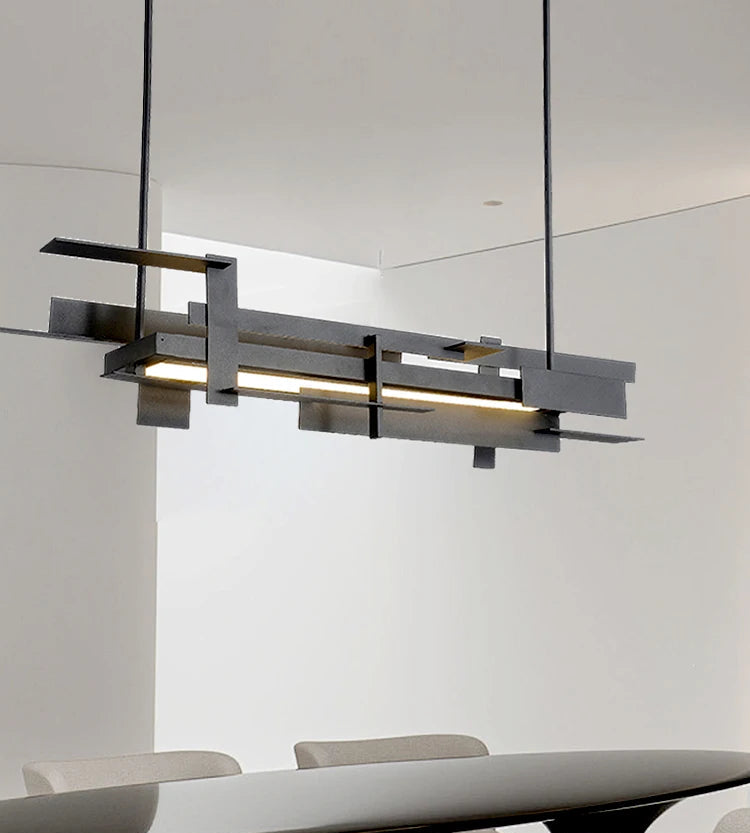 Artistic stainless steel chandelier in contemporary living room


