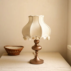 “Alloy bedside lamp with classic French silhouette and LED bulb”