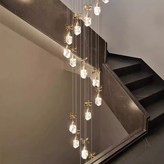 “Minimalist crystal foyer chandelier with gold accents”