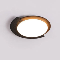 “Low-profile travertine-look ceiling light suited for kitchens and hallways.”