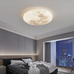 Ceiling light fixture designed to resemble the moon in a modern bedroom setting. Minimalist flush mount lunar lamp for bedroom, foyer, or balcony.