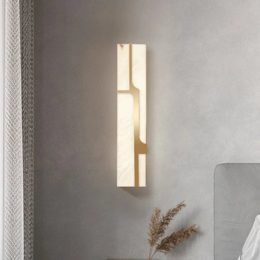 Modern alabaster-style wall sconce with integrated LED for bedroom bedside placement