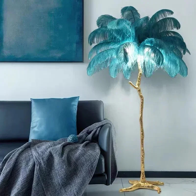 Palm tree floor lamp with gold base in a living room setting