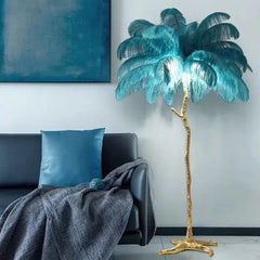 Palm tree floor lamp with gold base in a living room setting