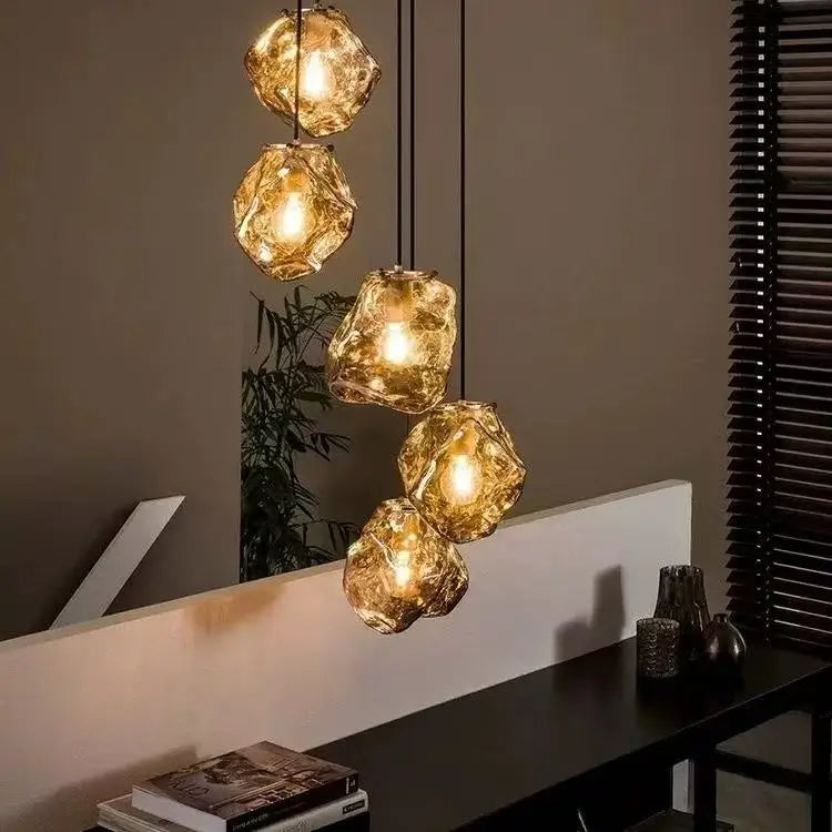 Close-up of lava glass texture on a polished chrome chandelier pendant