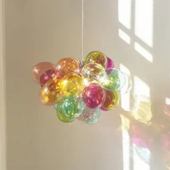 Semi-flush LED chandelier with clustered glass globes for ambient light
