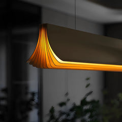 Modern long pendant light for kitchen table or island with wide light spread