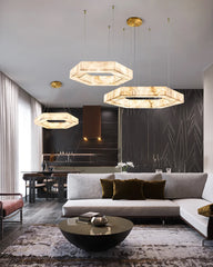 Alabaster-style ring chandelier suspended above a dining table