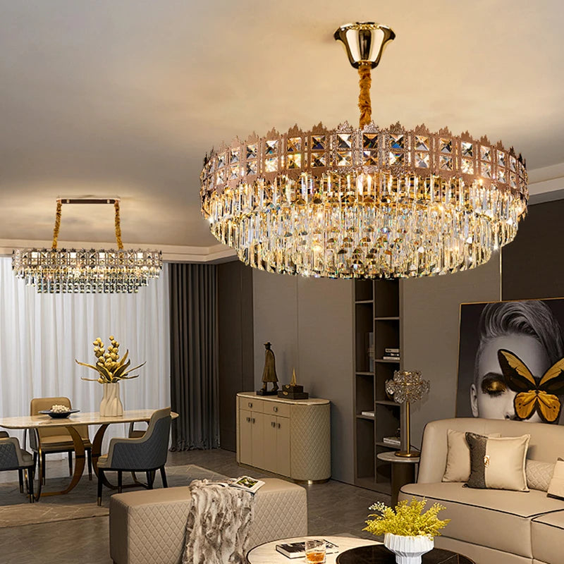Luxurious chandelier hanging in a modern living room with furniture and decor.