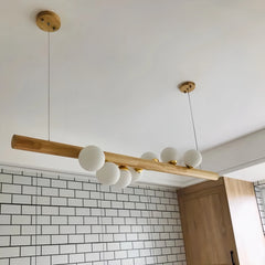 Hanging dining room chandelier with up and down light and globe shades