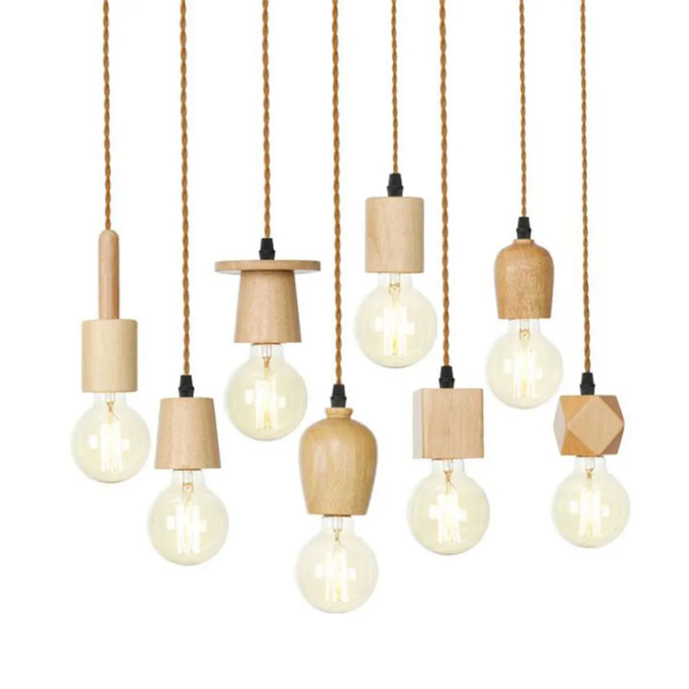 Set of hanging light fixtures with wooden bases and clear bulbs on a white background