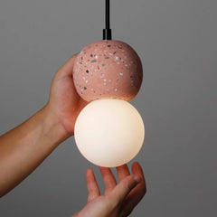 Modern cord pendant with terrazzo shade and diffused globe light for bedroom