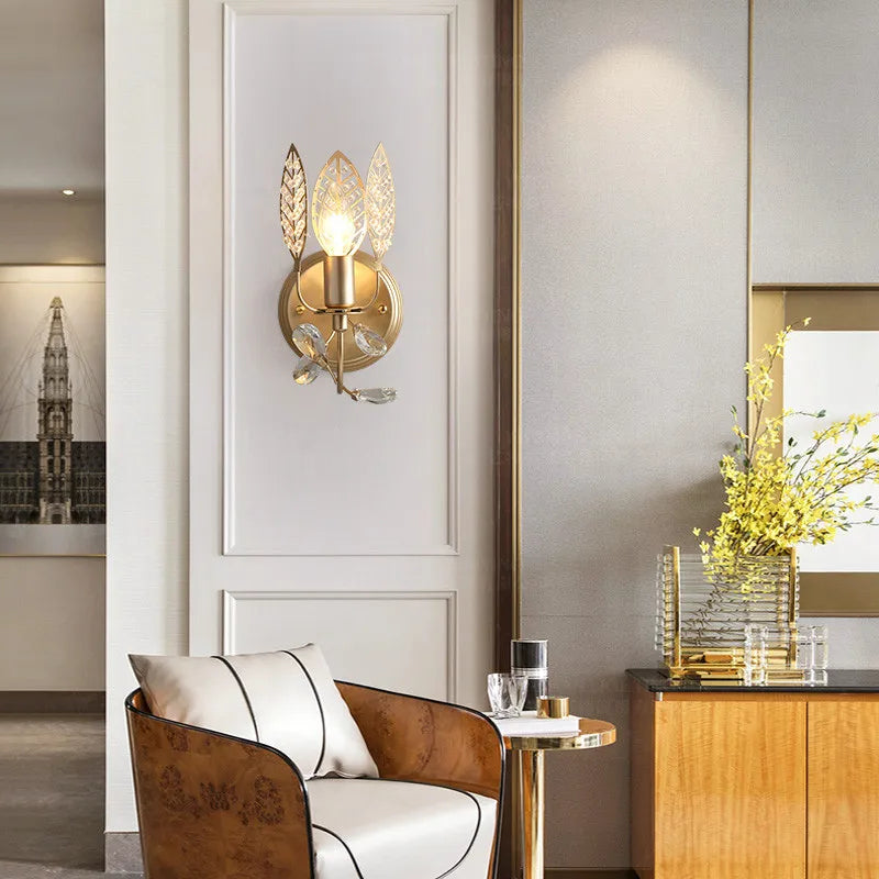 “Elegant gold leaves wall sconce for stylish home interiors”