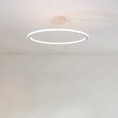Contemporary LED ring light installed in a clean modern interior