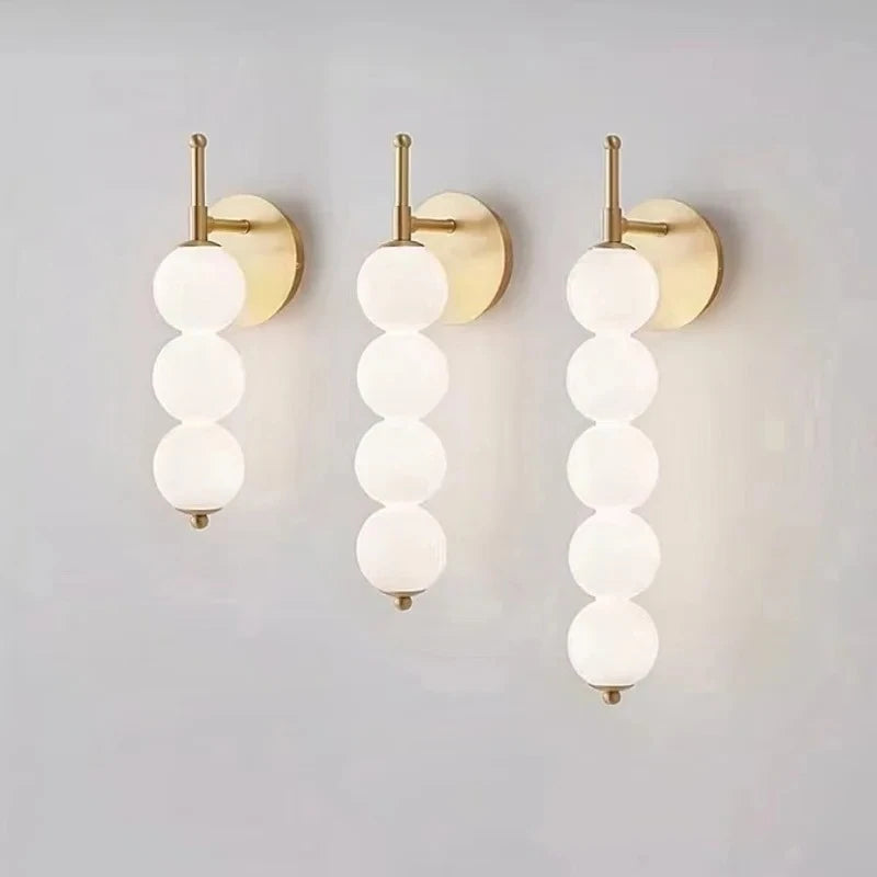 Frosted glass wall sconce designed for bedside ambient lighting