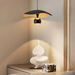 Minimalist Nordic pendant lamp casting a soft glow in a bedroom setting