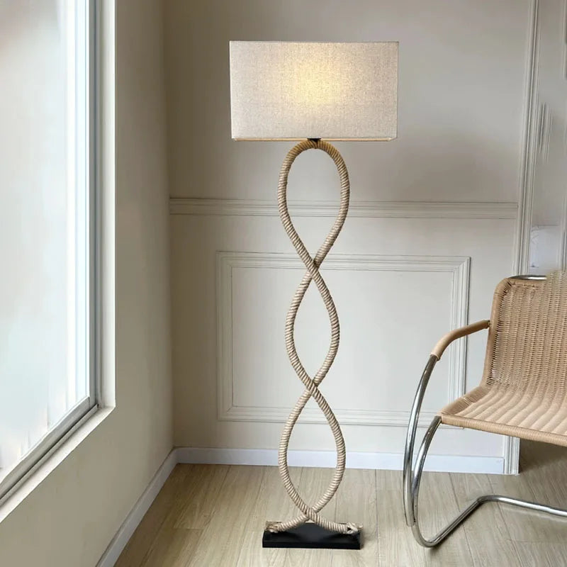 “Organic modern lamp with hand-knitted rope and soft fabric shade”