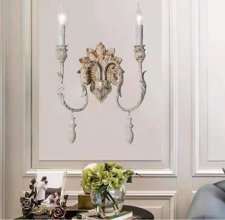 “Ornate double arm wall sconce for hallways and living rooms”