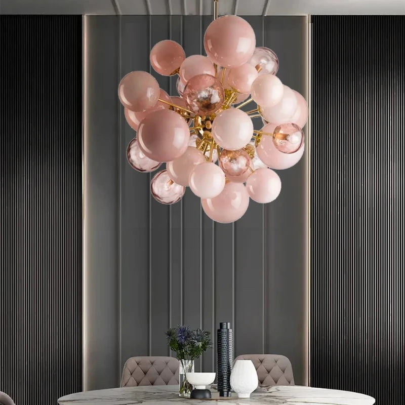 “Modern pink glass bubble chandelier for artistic interiors”
