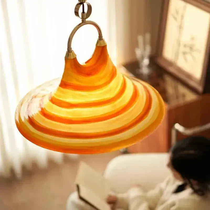 Plated iron finish acrylic chandelier enhancing a hotel room's décor