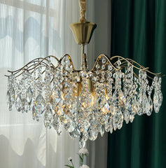 Plated polished steel crystal chandelier adding sparkle to cottage interiors