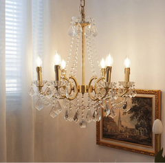 “Elegant chandelier for bedroom or foyer with crystal details”