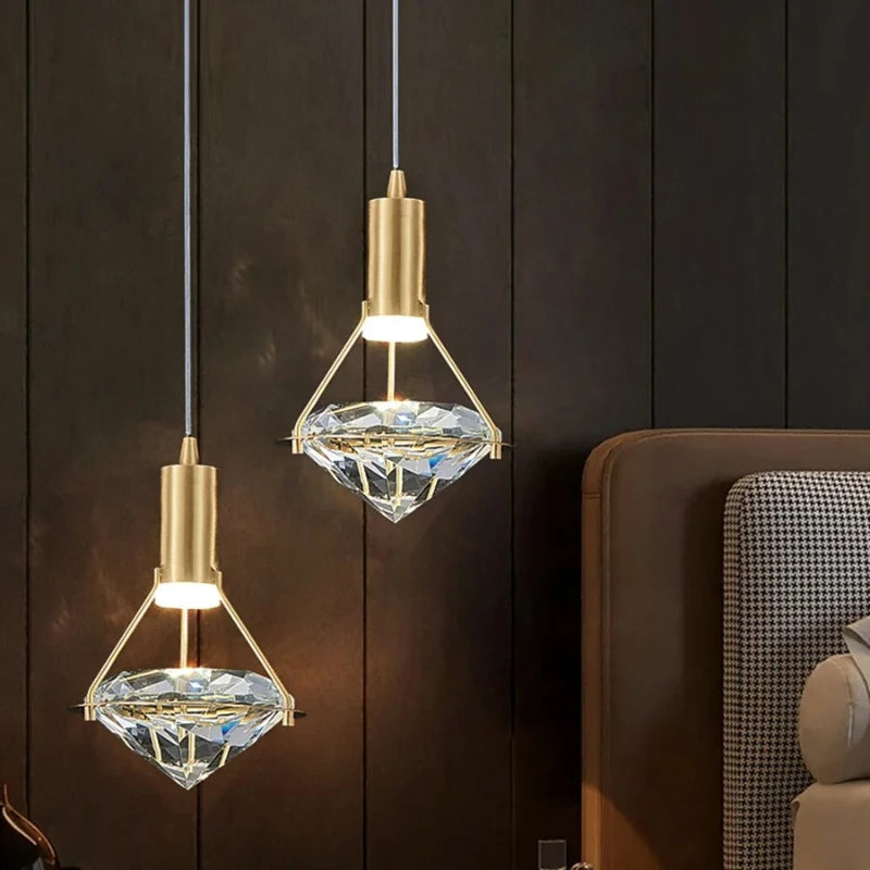 “Polished copper pendant lamp with sparkling crystal shade”