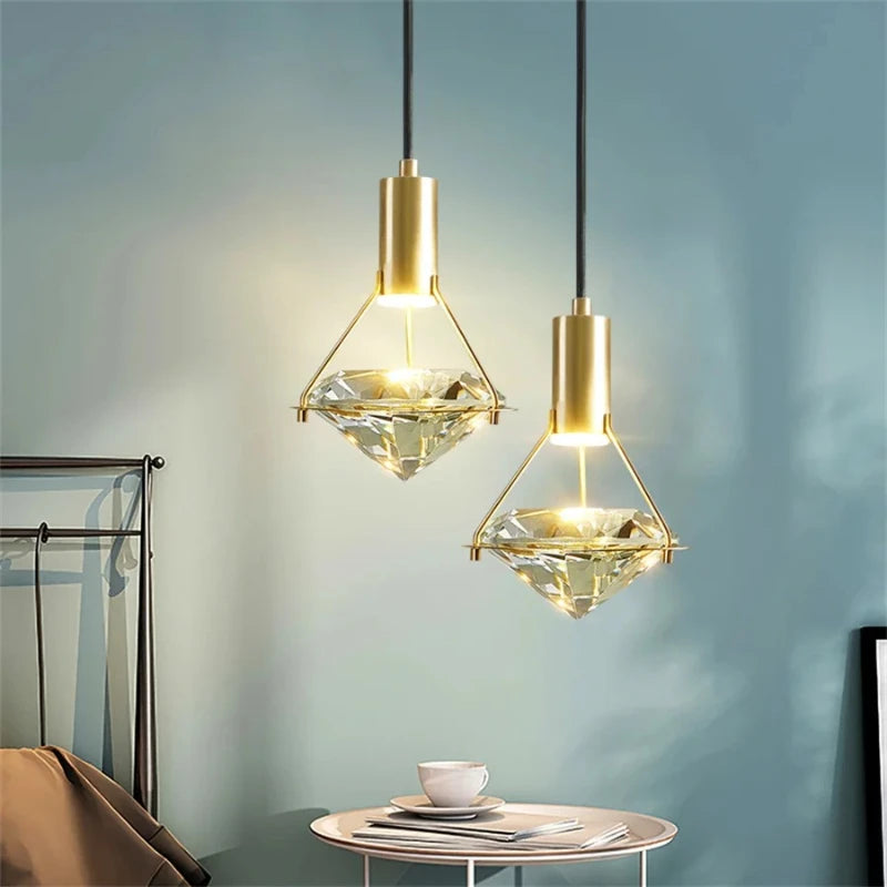 “Polished copper pendant lamp with sparkling crystal shade”