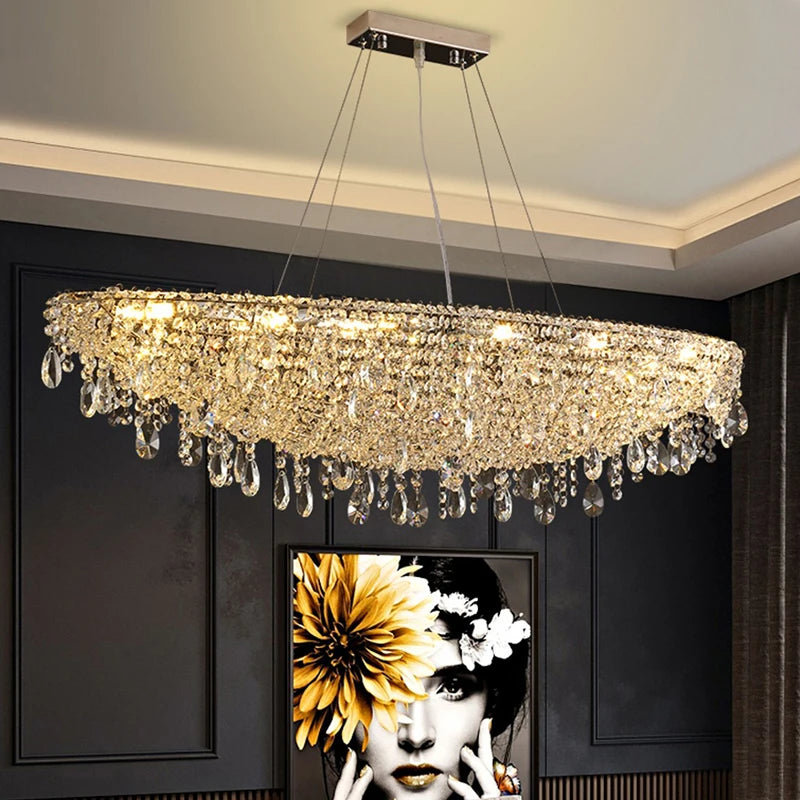 Remote control crystal pendant chandelier featured in upscale hotel décor