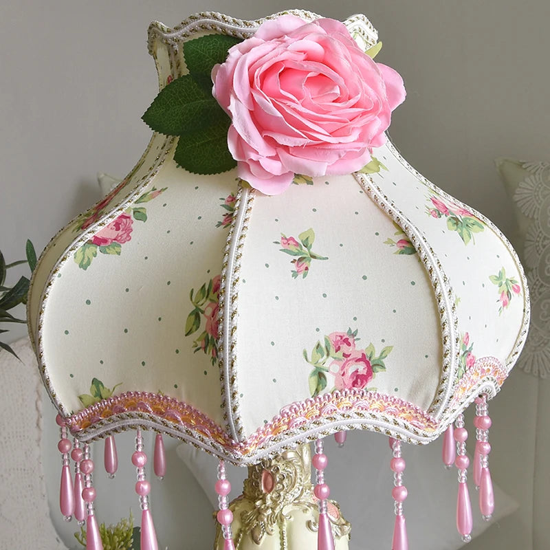 “Romantic resin nightstand lamp with embroidered fabric shade”
