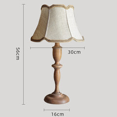 “Retro desk lamp in solid wood for cozy reading or study”