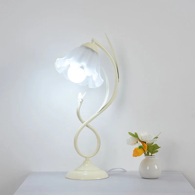 “Artistic petal-shaped bedside LED lamp for modern reading decor”
