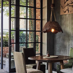 Scandinavian style pendant lamp illuminating a modern living corner