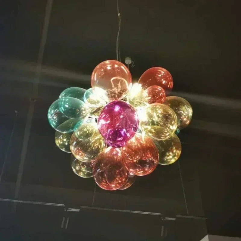 Stained glass sphere chandelier with a polished chrome metal frame