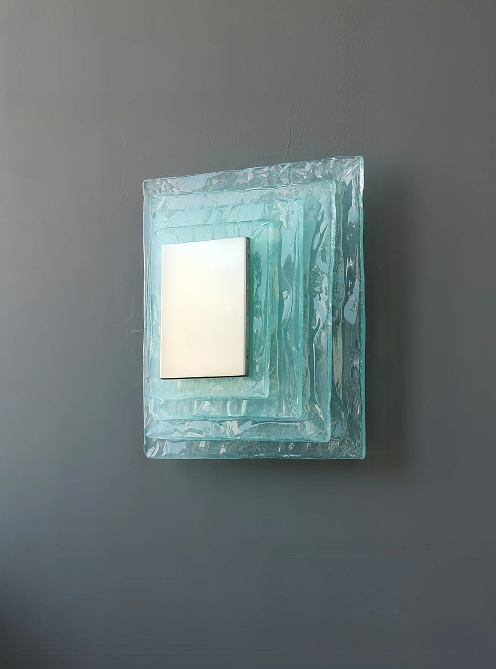 Wall mounted crystal sconce with two light sources for bathroom accent lighting