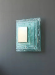 Wall mounted crystal sconce with two light sources for bathroom accent lighting