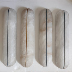 Alabaster marble wall light installed as staircase wall fixture with copper body