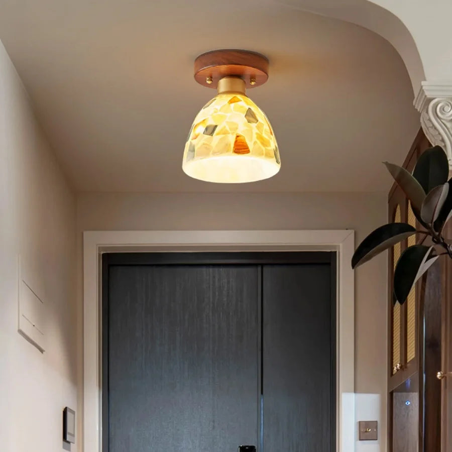 “Tiffany-style colored glass shell ceiling light with wood canopy”