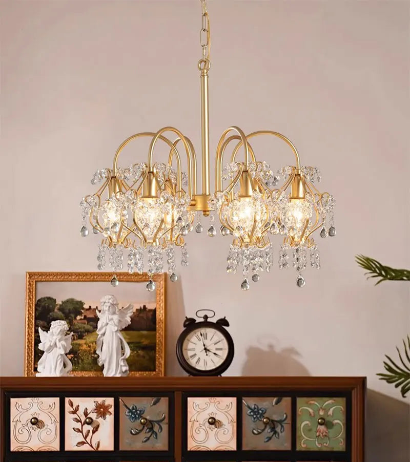 Traditional style crystal-accent chandelier installed in living room as ceiling feature