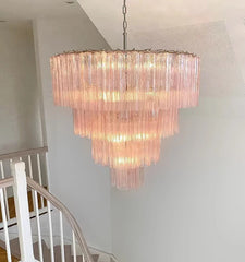 Unique up-and-down shade glass chandelier bringing balanced light to the home
