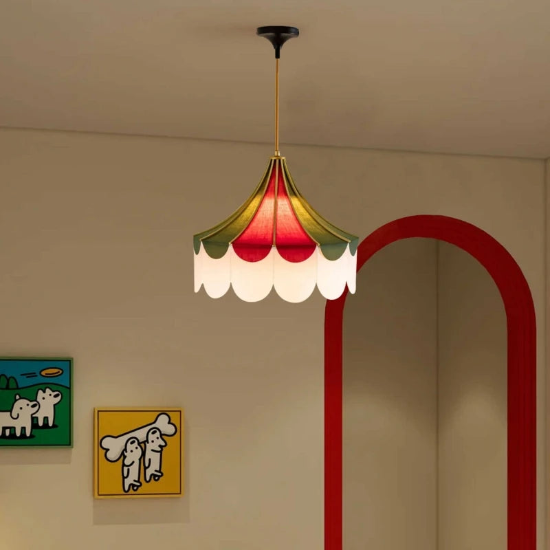 “Vintage scalloped fabric pendant light hanging in a cozy room with warm ambient glow.”