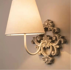 “Vintage white wooden wall lamp with fabric shade”