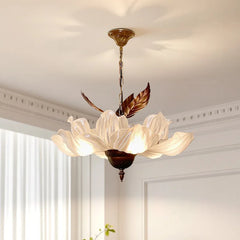 Elegant white acrylic pendant lamp illuminating a stylish master bedroom