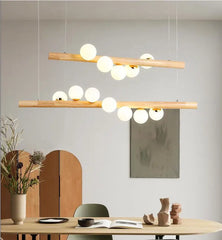 Wood beam chandelier with frosted glass shades for dining table lighting