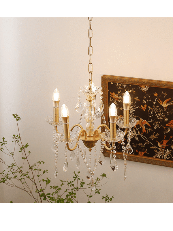 Elegant copper crystal chandelier with multiple lights.