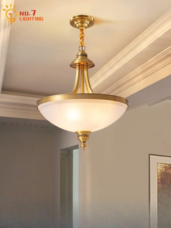 Modern gold LED pendant light with a bowl shade.