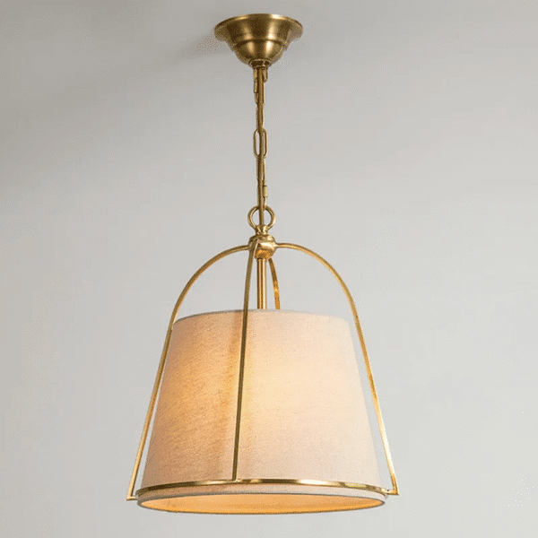 Vintage fabric pendant light with gold frame.